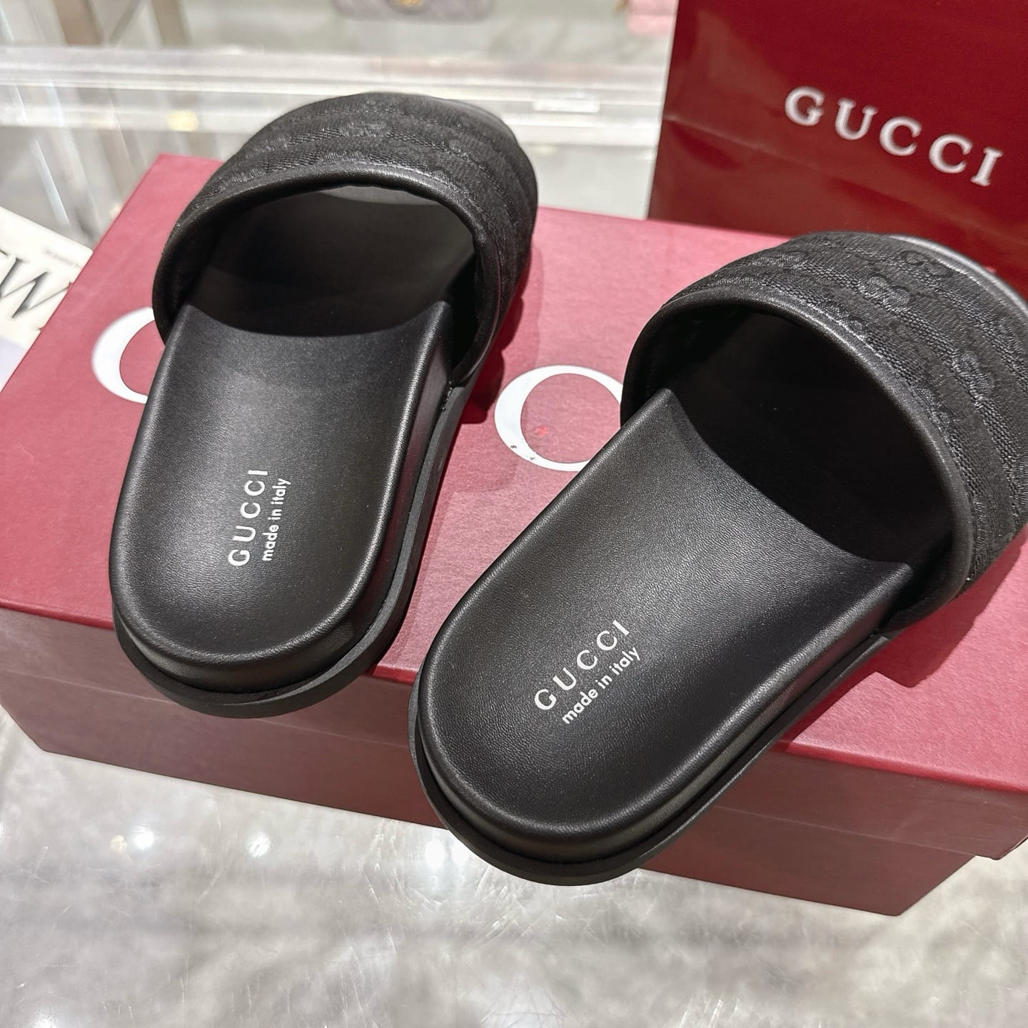 GUCCI Men's slide sandal Black padded GG canvas