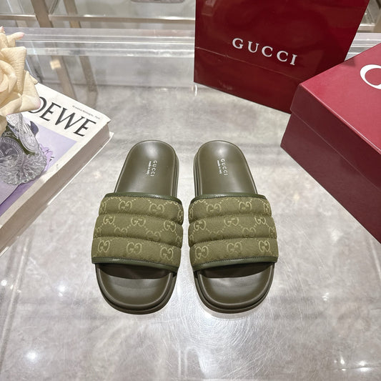 GUCCI Men's slide sandal dark green padded GG canvas
