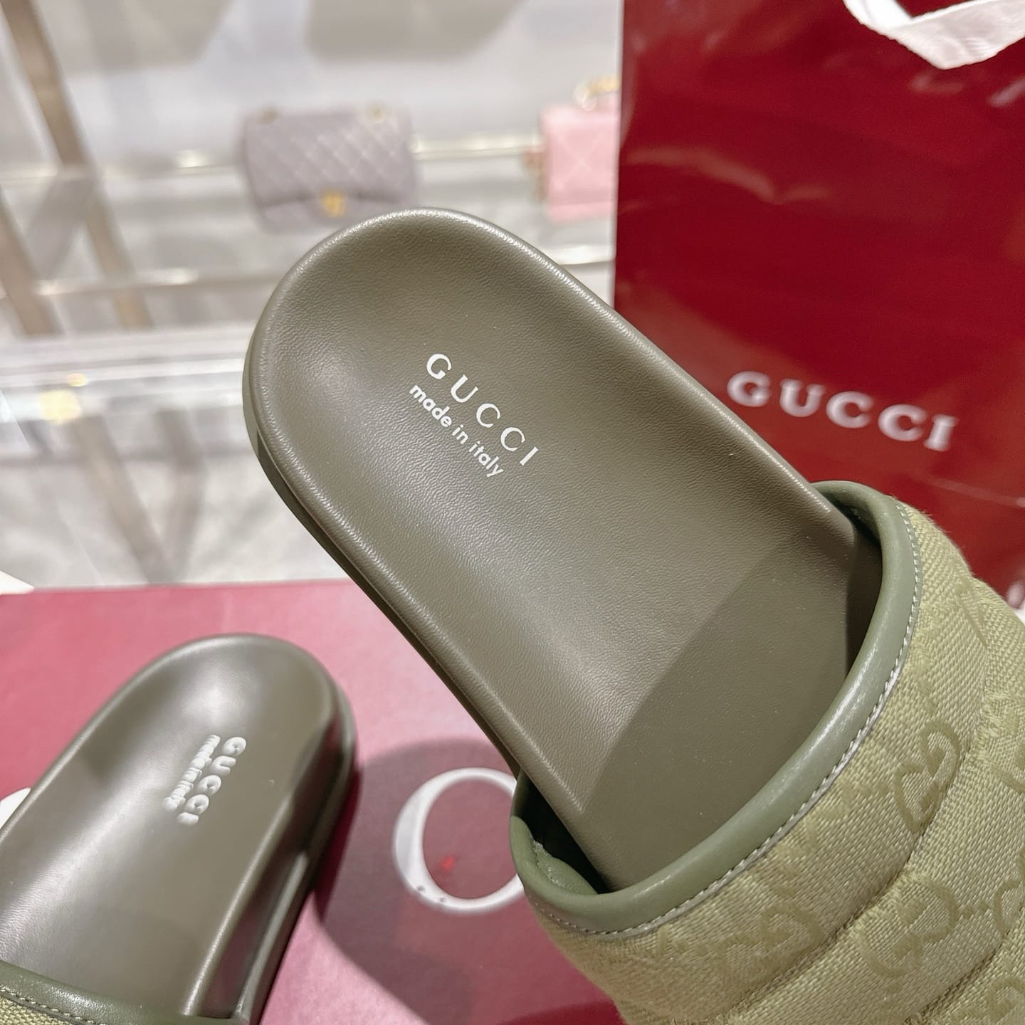 GUCCI Men's slide sandal dark green padded GG canvas