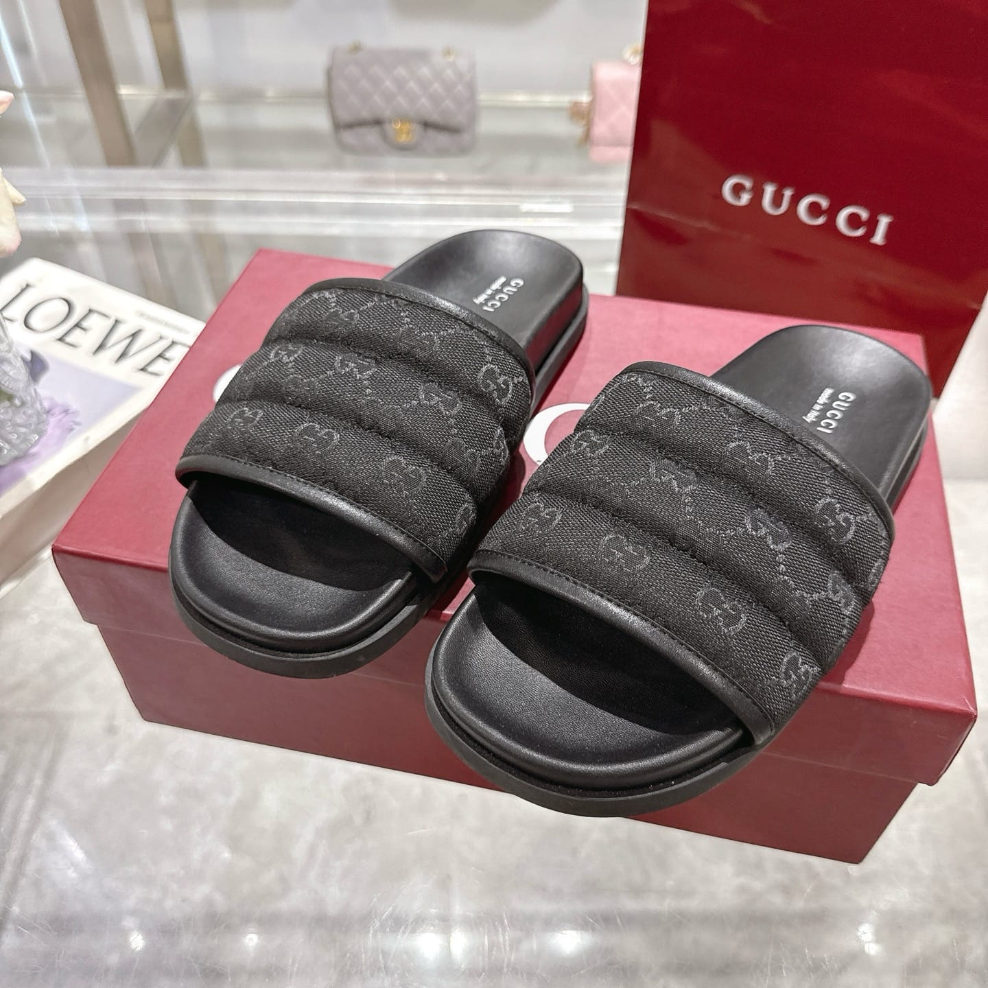 GUCCI Men's slide sandal Black padded GG canvas