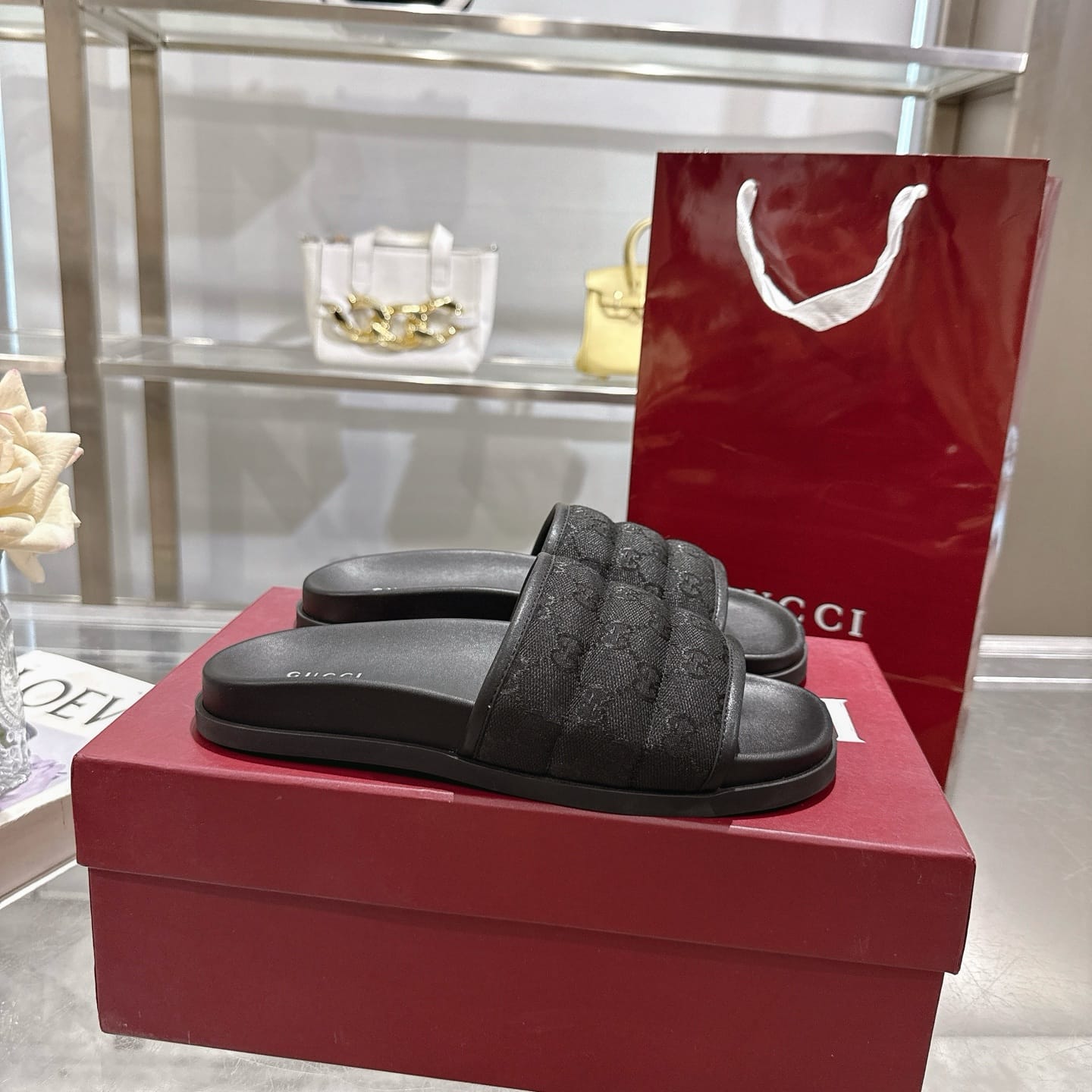 GUCCI Men's slide sandal Black padded GG canvas
