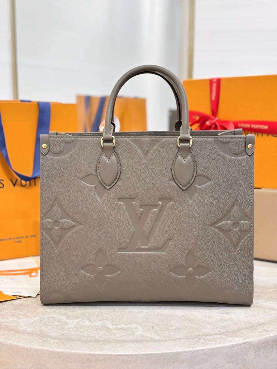 Louis Vuitton OnTheGo MM Monogram Empreinte leather Hand Bags for women