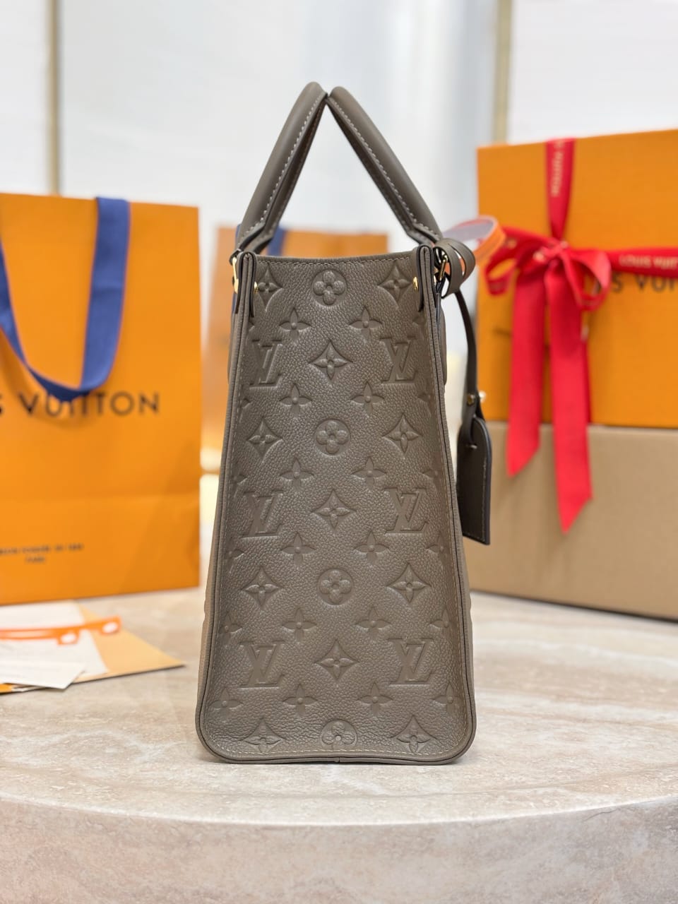 Louis Vuitton OnTheGo MM Monogram Empreinte leather Hand Bags for women