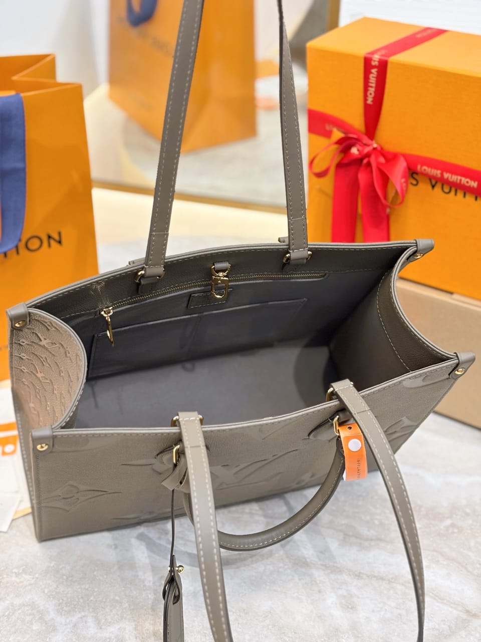 Louis Vuitton OnTheGo MM Monogram Empreinte leather Hand Bags for women