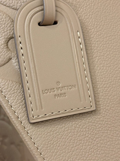 Louis Vuitton OnTheGo MM Monogram Empreinte leather Hand Bags for women