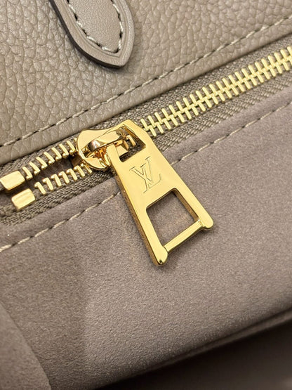 Louis Vuitton OnTheGo MM Monogram Empreinte leather Hand Bags for women