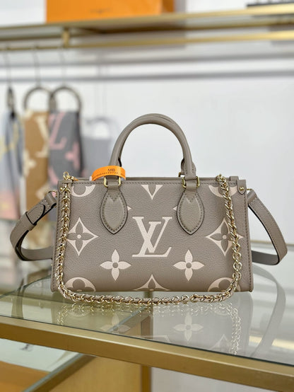 Louis Vuitton Dove/Cream Hand Bags for women