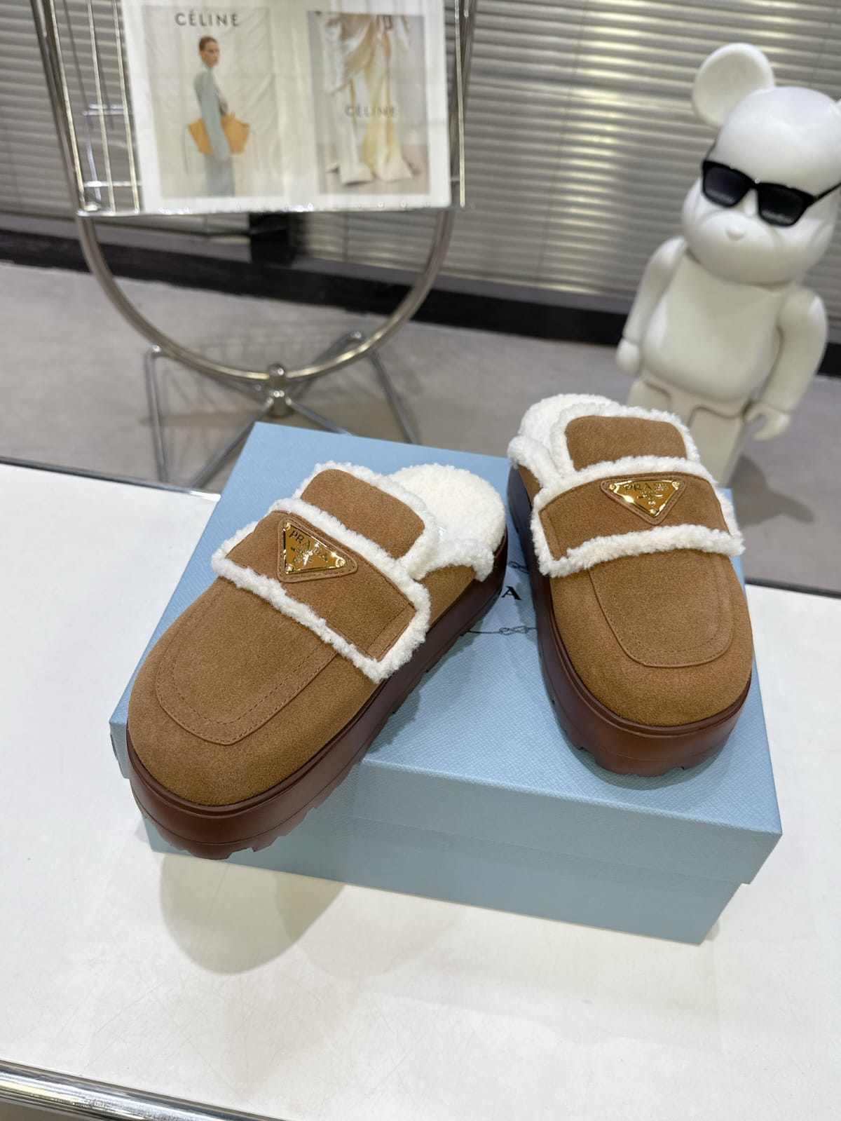 Prada Suede and shearling slippers for women