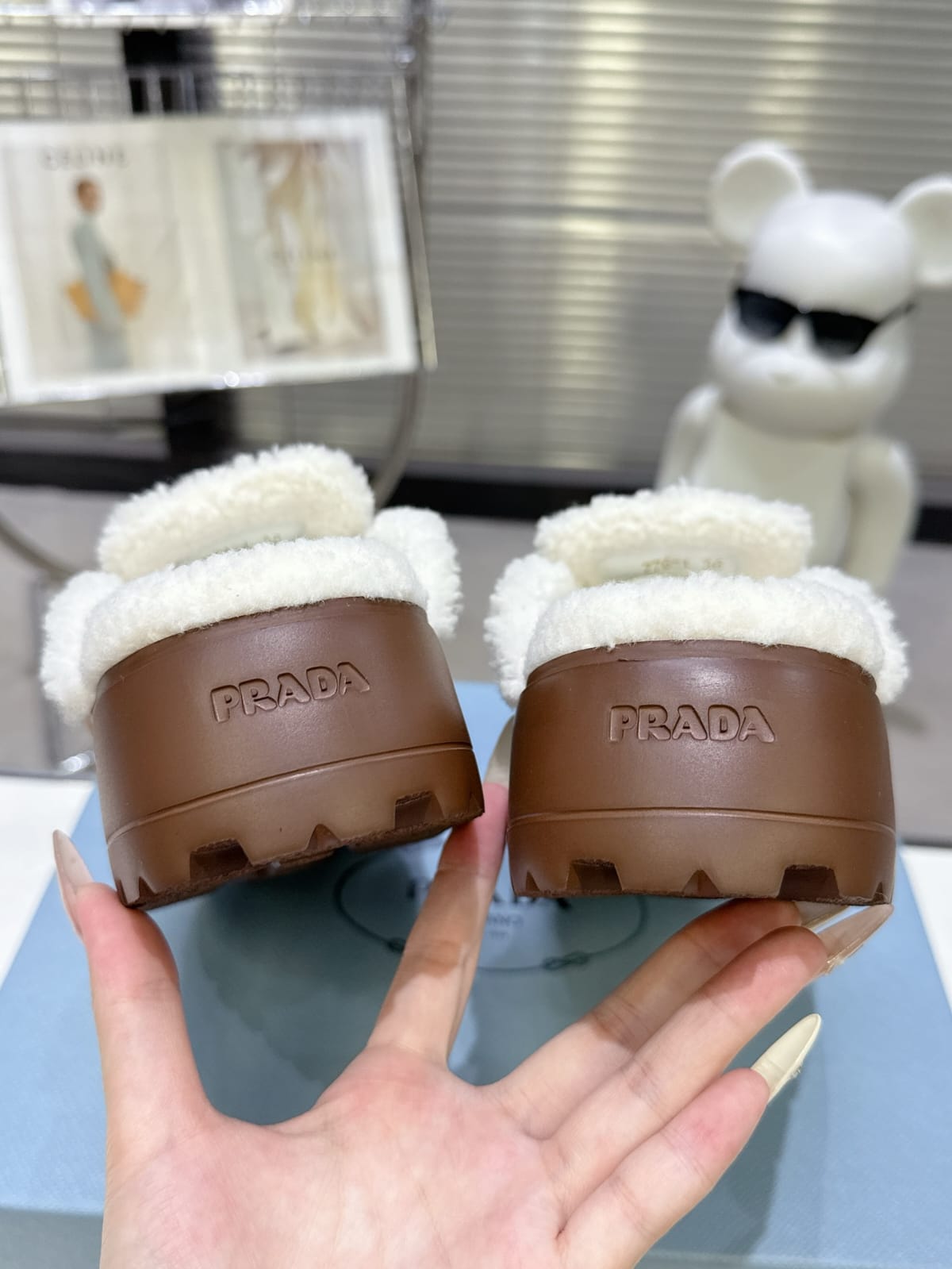 Prada Suede and shearling slippers for women