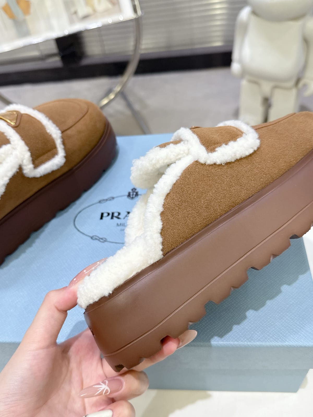 Prada Suede and shearling slippers for women