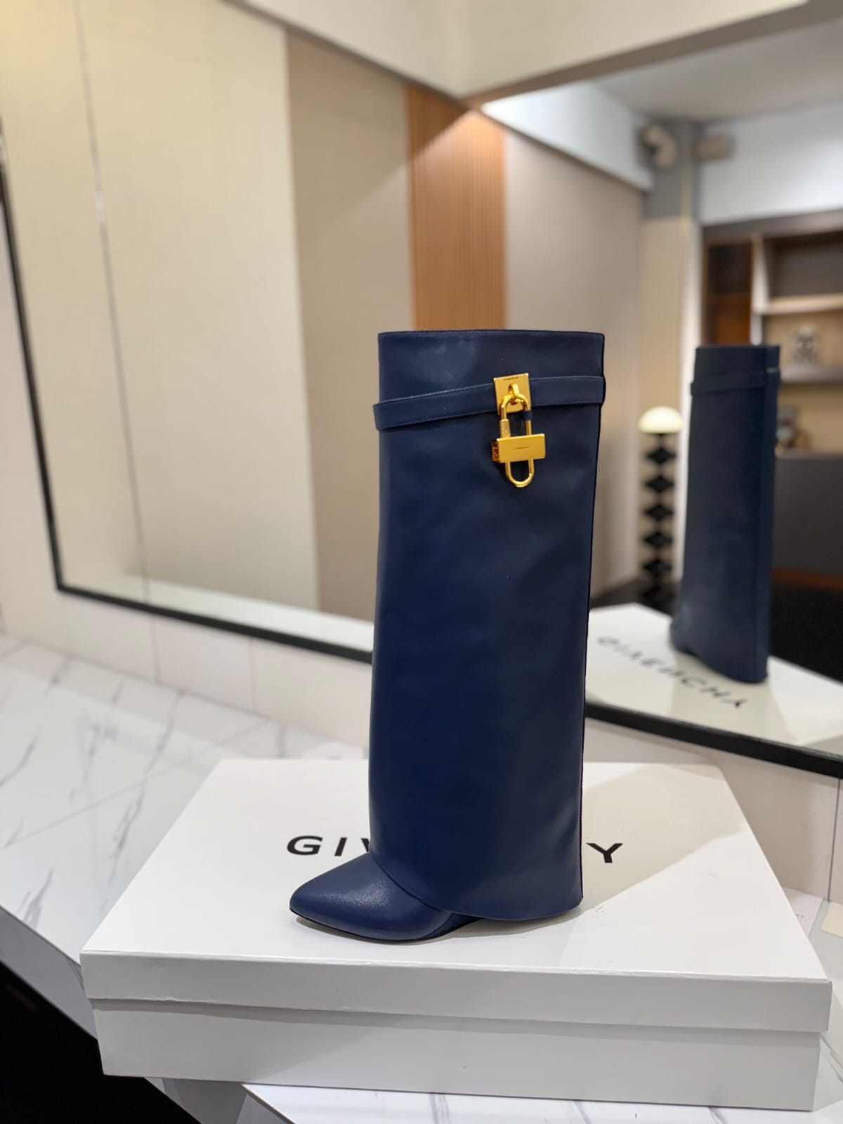 Givenchy Shark Lock boots in leather for women