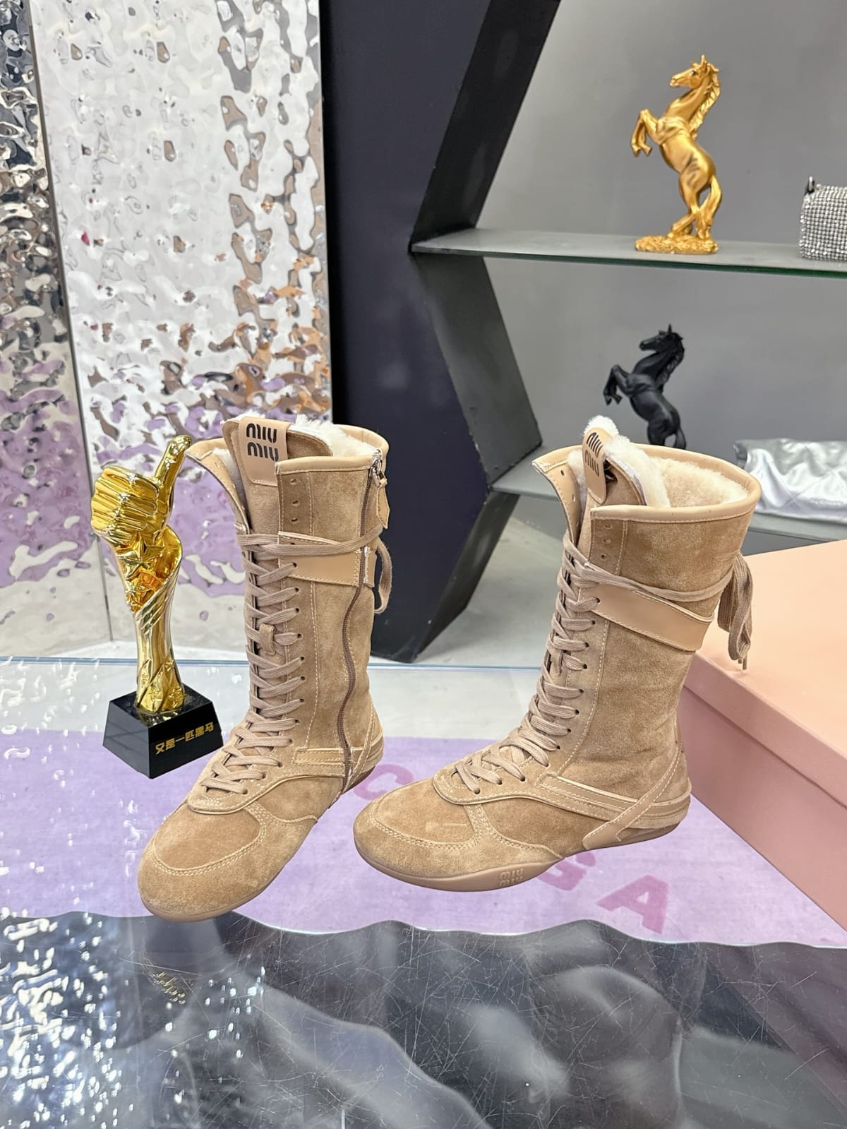 Miu Miu  Gymnasium suede and shearling boxer boots for women