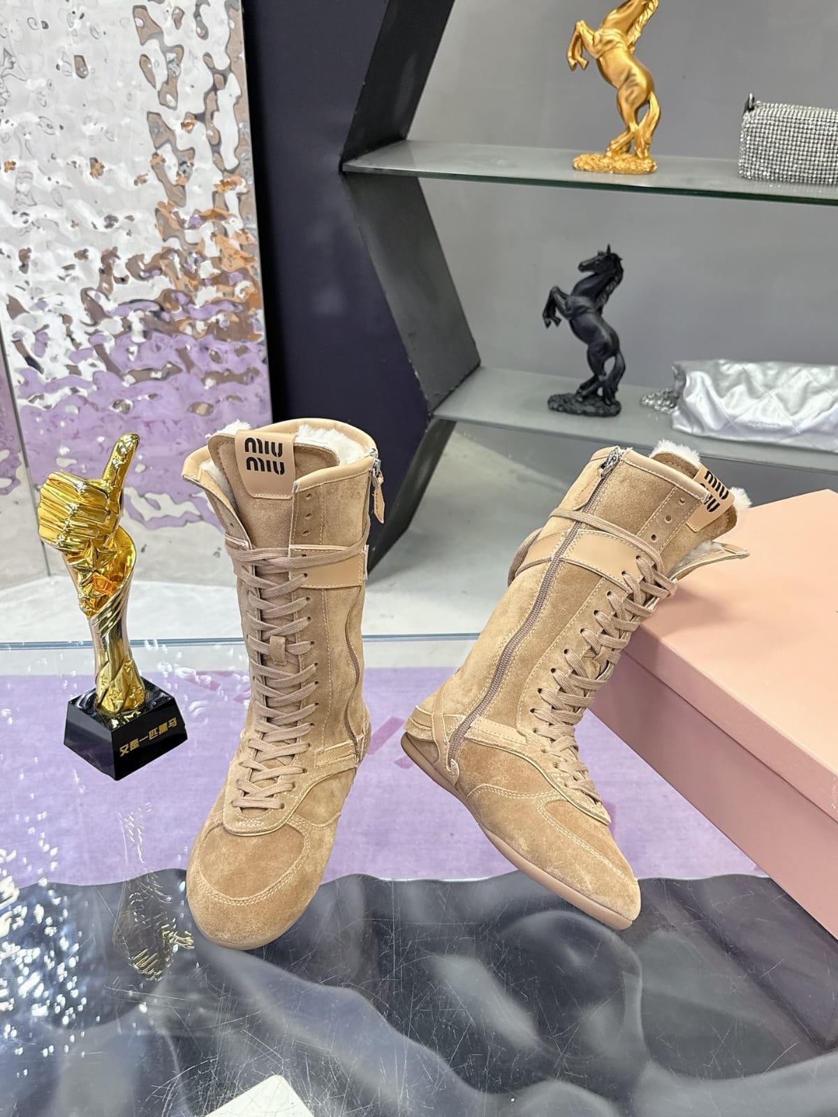 Miu Miu  Gymnasium suede and shearling boxer boots for women