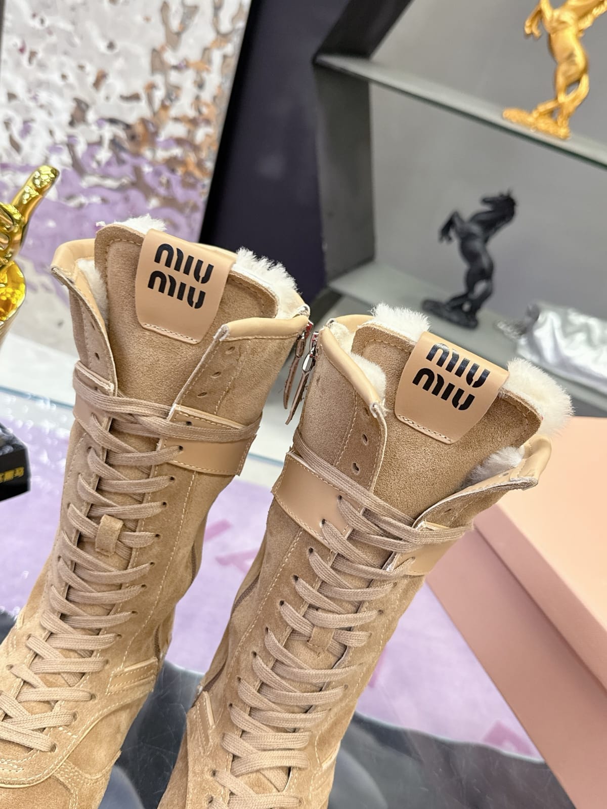 Miu Miu  Gymnasium suede and shearling boxer boots for women