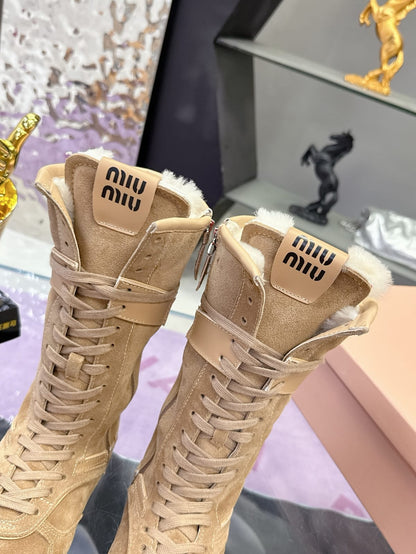 Miu Miu  Gymnasium suede and shearling boxer boots for women