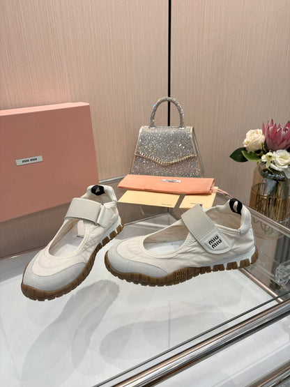 Miu Miu  Tyre technical fabric and suede ballerinas for women