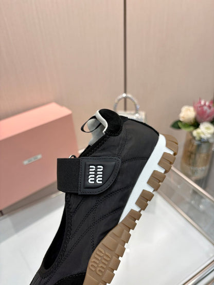 Miu Miu  Tyre technical fabric and suede ballerinas for women